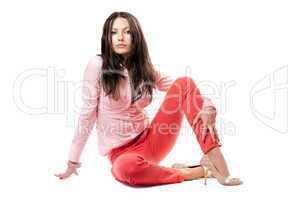 Pretty young woman in red jeans
