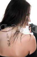 Brunette with tattoo on her back