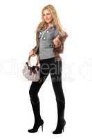 Beautiful playful young blonde with a handbag