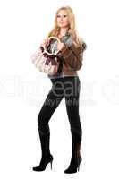 Beautiful playful young blonde with a handbag. Isolated