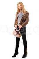 Beautiful young blonde with a handbag. Isolated