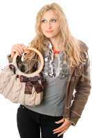 Portrait of lovely young blonde with a handbag