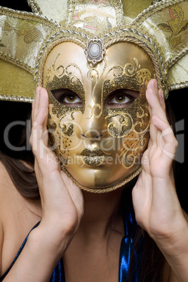 Portrait of girl in a Venetian mask
