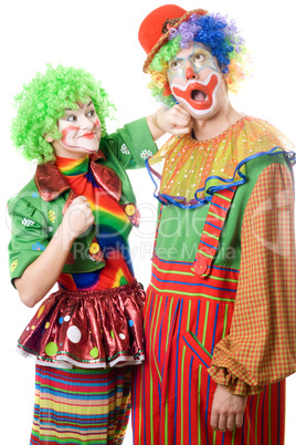 Female clown punching clown