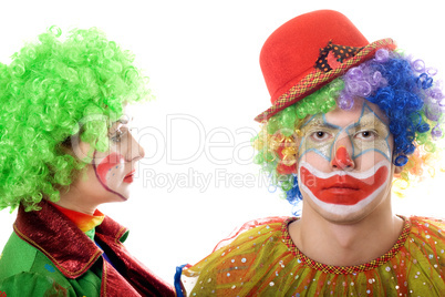 Portrait of a pair of serious clowns