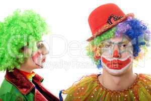 Portrait of a pair of serious clowns