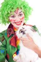 Female clown with a white rabbit