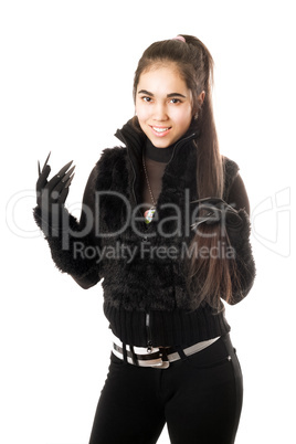 Portrait of happy young brunette in gloves
