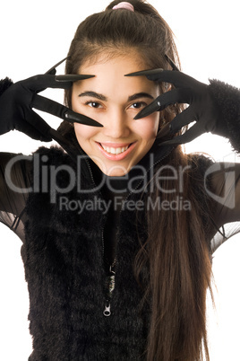 Portrait of smiling young woman in gloves