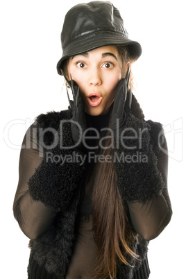 Portrait of surprised girl in gloves with claws