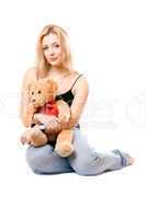 Lovely blonde with a teddy bear