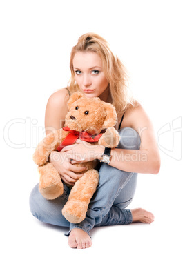 Beautiful blonde with a teddy bear