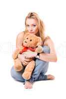 Beautiful blonde with a teddy bear