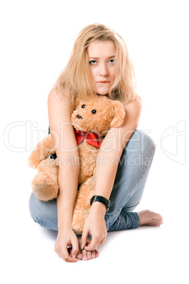 Pretty blonde with a teddy bear