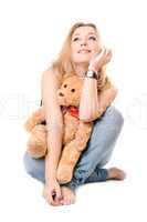 Pretty dreamy blonde with a teddy bear