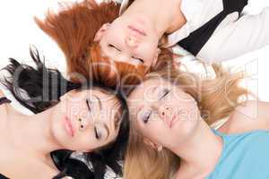 Three women with closed eyes