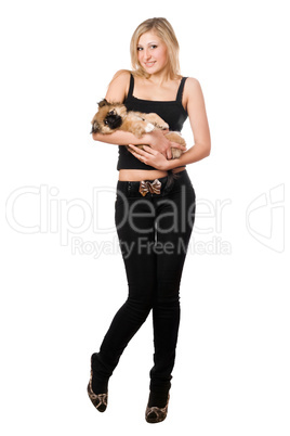 Pretty blonde holding pekinese