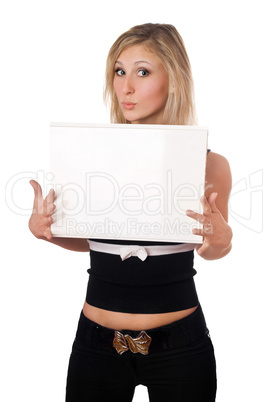 Surprised blonde holding white board