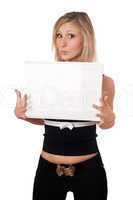 Surprised blonde holding white board
