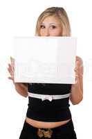 Surprised woman holding white board