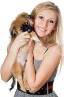 Smiling woman with a puppy