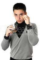 Young man with a glass. Isolated