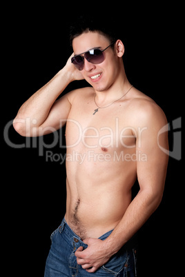 Portrait of smiling young man. Isolated