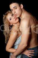 Portrait of attractive young couple. Isolated