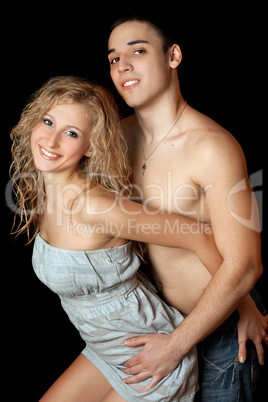 Portrait of cheerful beautiful young couple. Isolated