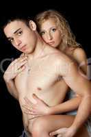 Attractive loving young couple. Isolated