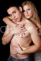 Portrait of passionate young couple. Isolated