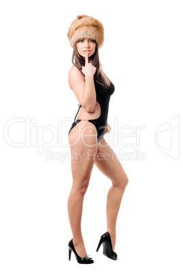 Attractive woman wearing swimsuit and fur-cap