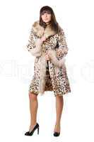 Young sexy lady in leopard coat