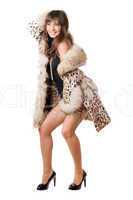 joyful woman wearing swimsuit and leopard coat