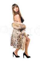 brunette wearing leopard coat
