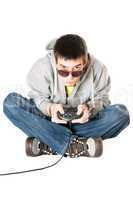 Young man in sunglasses with a joystick