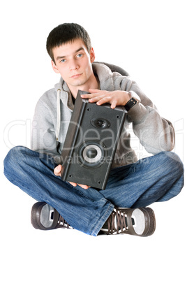 Young man with a speaker