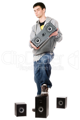 Young man with a four speakers