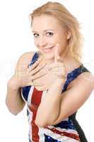 cheerful blonde showing her forefinger