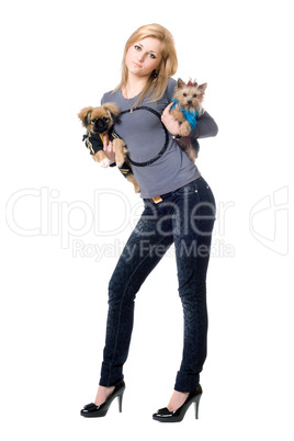 Pretty blonde posing with two dogs