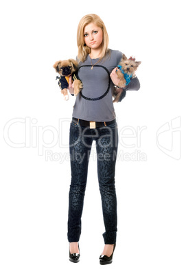 Lovely young blonde posing with two dogs