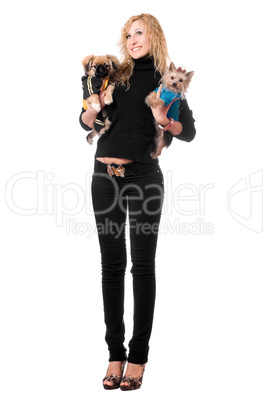 Happy young blonde posing with two dogs
