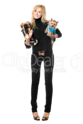Happy blonde posing with two dogs