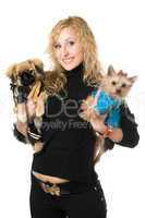 Portrait of smiling young blonde with two dogs