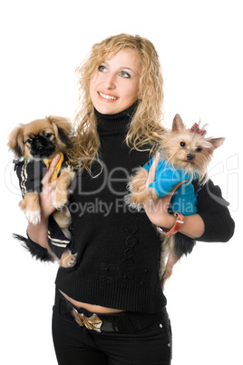 Portrait of happy young blonde with two dogs