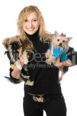 Portrait of joyful young blonde with two dogs