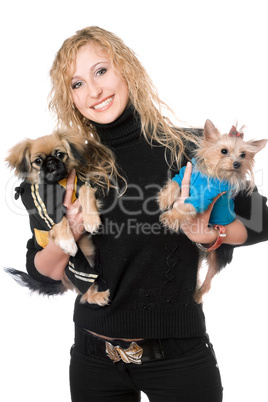 Portrait of joyful pretty blonde with two dogs