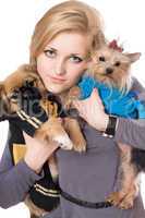 Portrait of attractive blonde with two dogs. Isolated