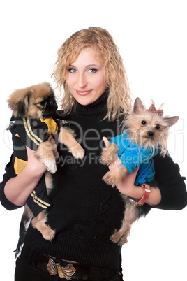 Portrait of smiling pretty blonde with two dogs. Isolated