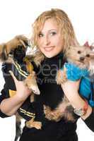Portrait of smiling beautiful blonde with two dogs. Isolated